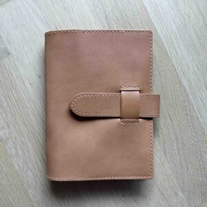 Travelers’ Personal notebook cover with belt closure