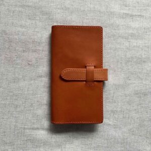 Travelers’ Notebook cover with belt closure
