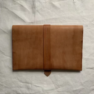 ‘Leather purse for stationery’