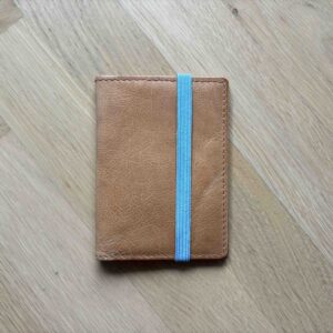 Pocket / passport size cover with side closure