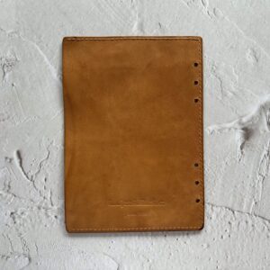 ‘Leather flyleaf with full-length pocket’