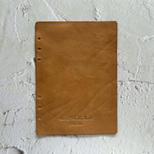 ‘Leather flyleaf with one layer of leather’
