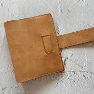 A6 rings cover with chunky belt closure