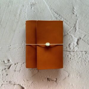 Trifold leather journal with sleeve pocket