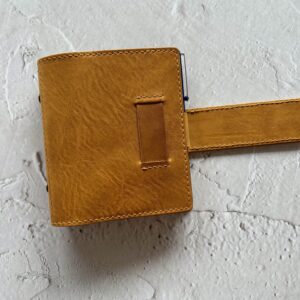 Pocket rings cover with chunky belt closure