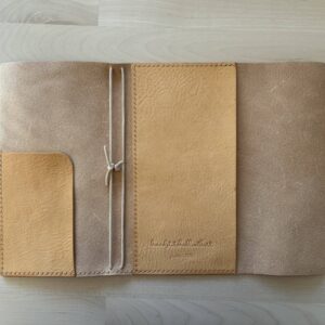 Trifold leather journal with two pockets inside